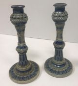A pair of Martin Brothers incised blue g