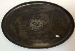 A Hugh Wallis copper tray of oval form w