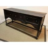 An 18th Century oak dresser, the plank t