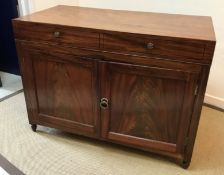 A mahogany side cabinet in the Regency t