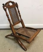 A Victorian child's folding caned campai