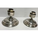 A pair of plated candle light bases of s