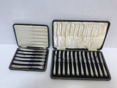 A cased set of twelve silver handled but