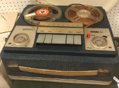 An Akai 3000D solid state reel to reel t