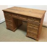 A modern pine double pedestal desk, the