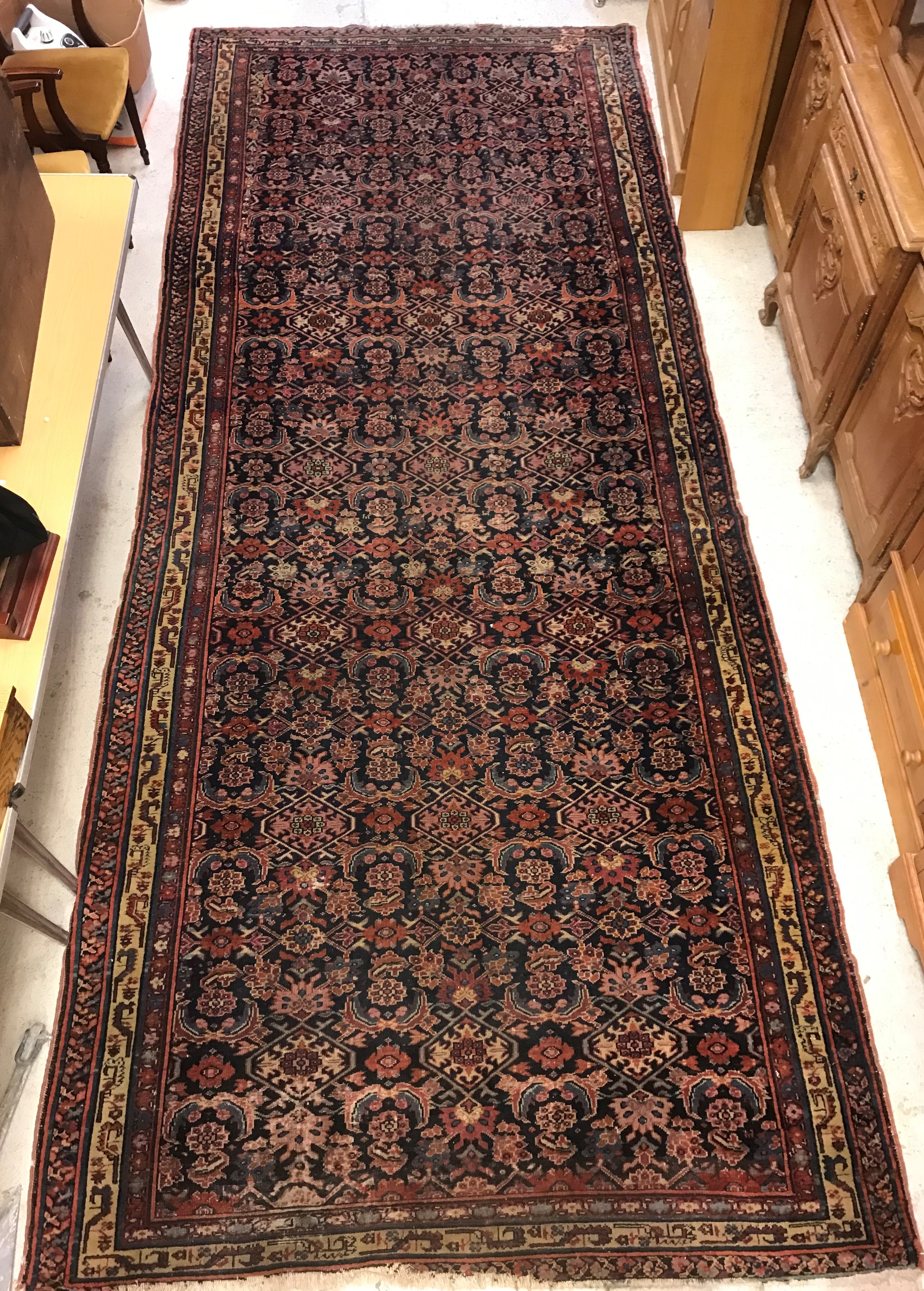 A large Caucasian carpet, the central pa