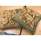 Two scatter cushions with floral woolwork panels