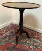 An early 19th Century mahogany tea table,