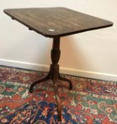 An early 19th Century oak tea table,