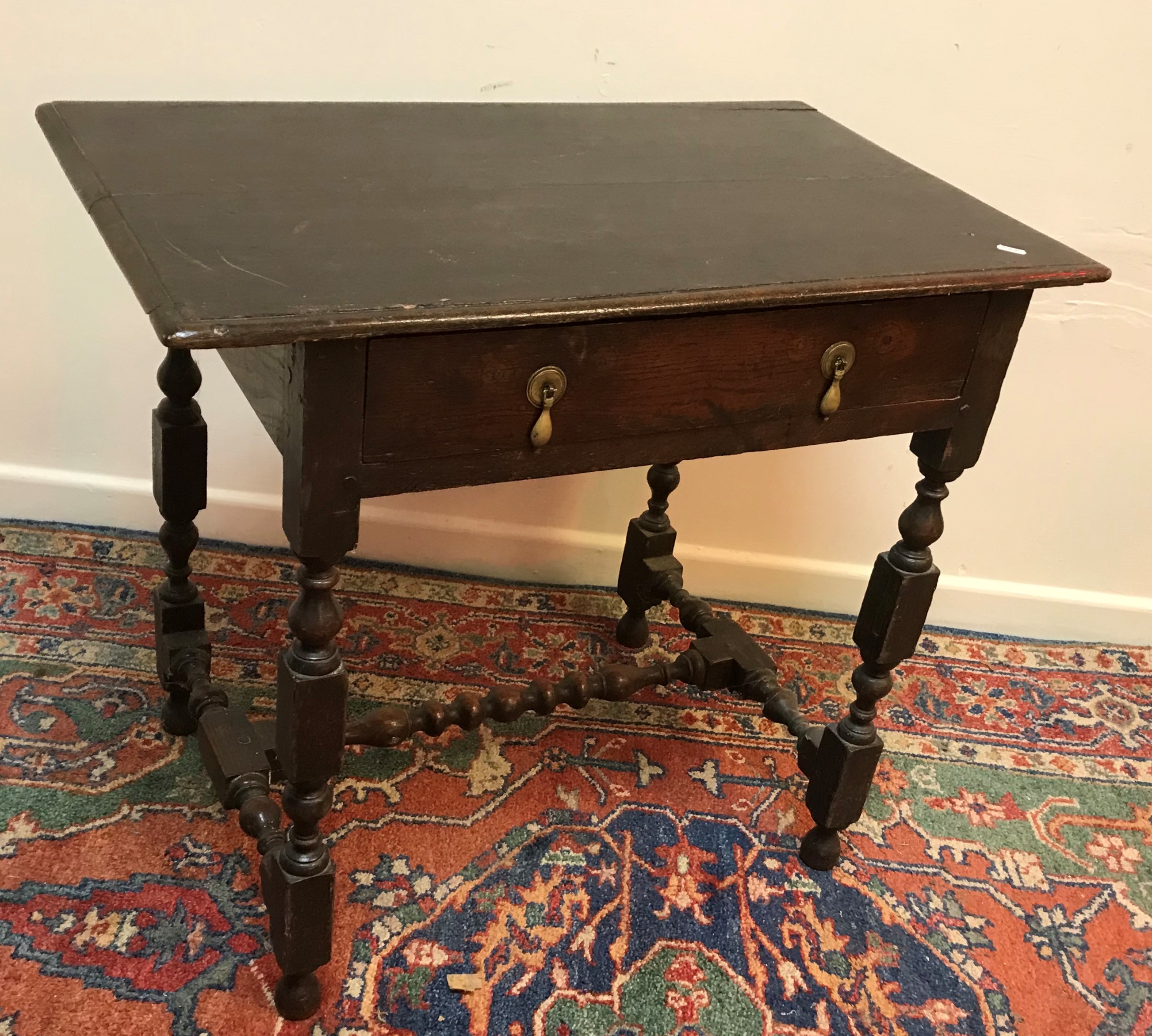 A 19th Century oak side table in the 17th Century manner,