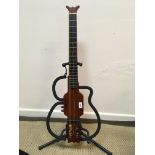 An Aria Sinsonido mahogany travel guitar with gig bag