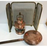 A copper and brass ship's lamp bearing label inscribed "Mast head PATT.