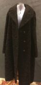 An Astraka double breasted fur coat with label inscribed 