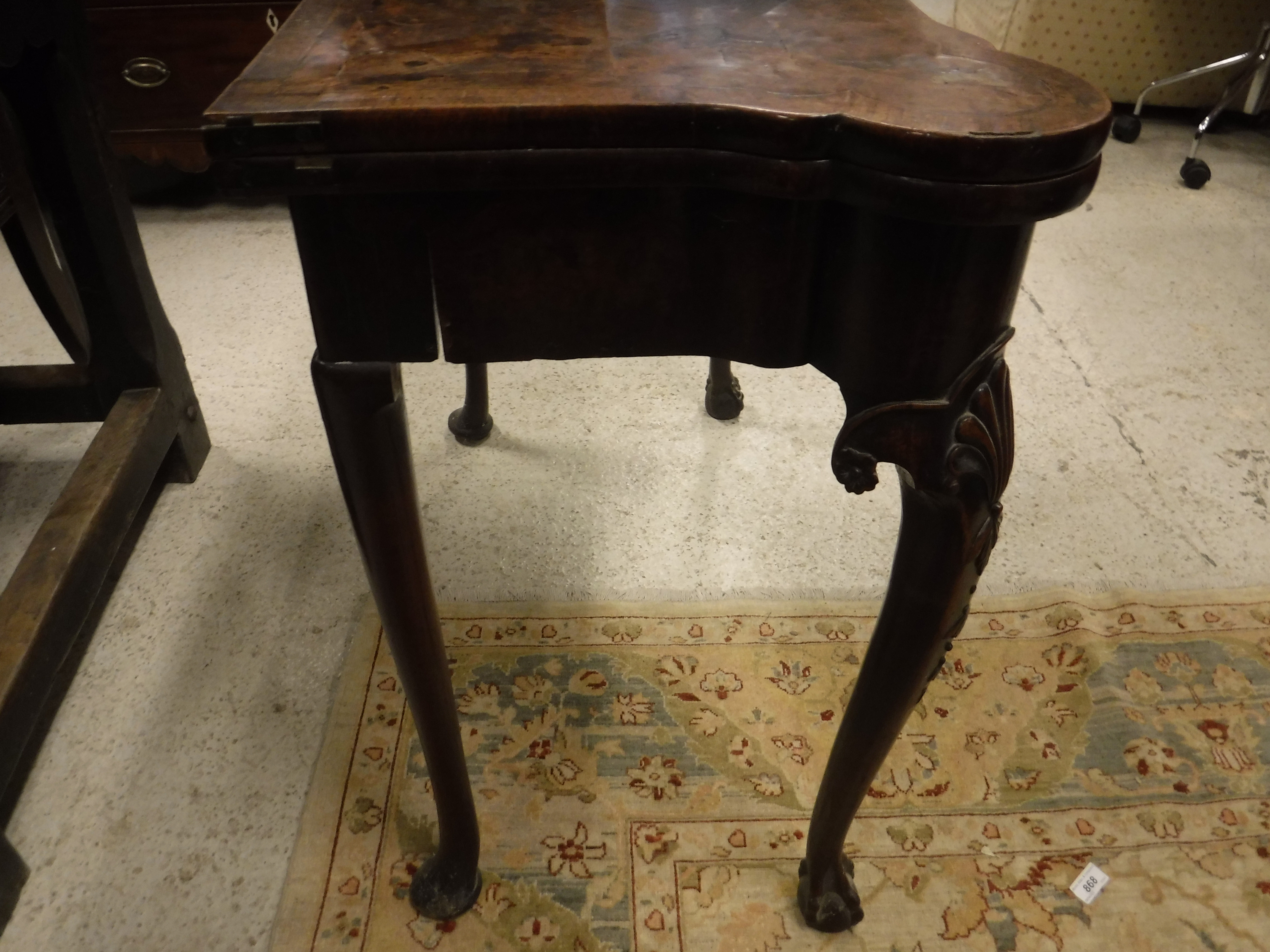 An 18th Century walnut veneered card table, the shaped top quartered, - Image 14 of 36