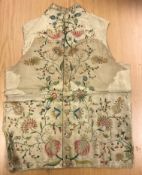 An early 19th Century silk and embroidered gentleman's waistcoat CONDITION REPORTS