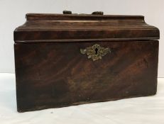 A George III mahogany sarcophagus shaped tea caddy with ornate brass swan neck handle 25.