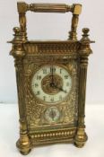 A circa 1900 French lacquered brass cased carriage clock,