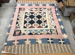 A 19th Century patchwork quilt,