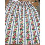 A pair of glazed cotton multi-coloured floral and striped interlined curtains with taped pencil