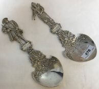 Two Victorian silver spoons by Berthold Muller, one depicting Henry VIII, the other Elizabeth I,