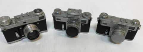 A collection of nine various Russian cameras including a Lubitel 166B,