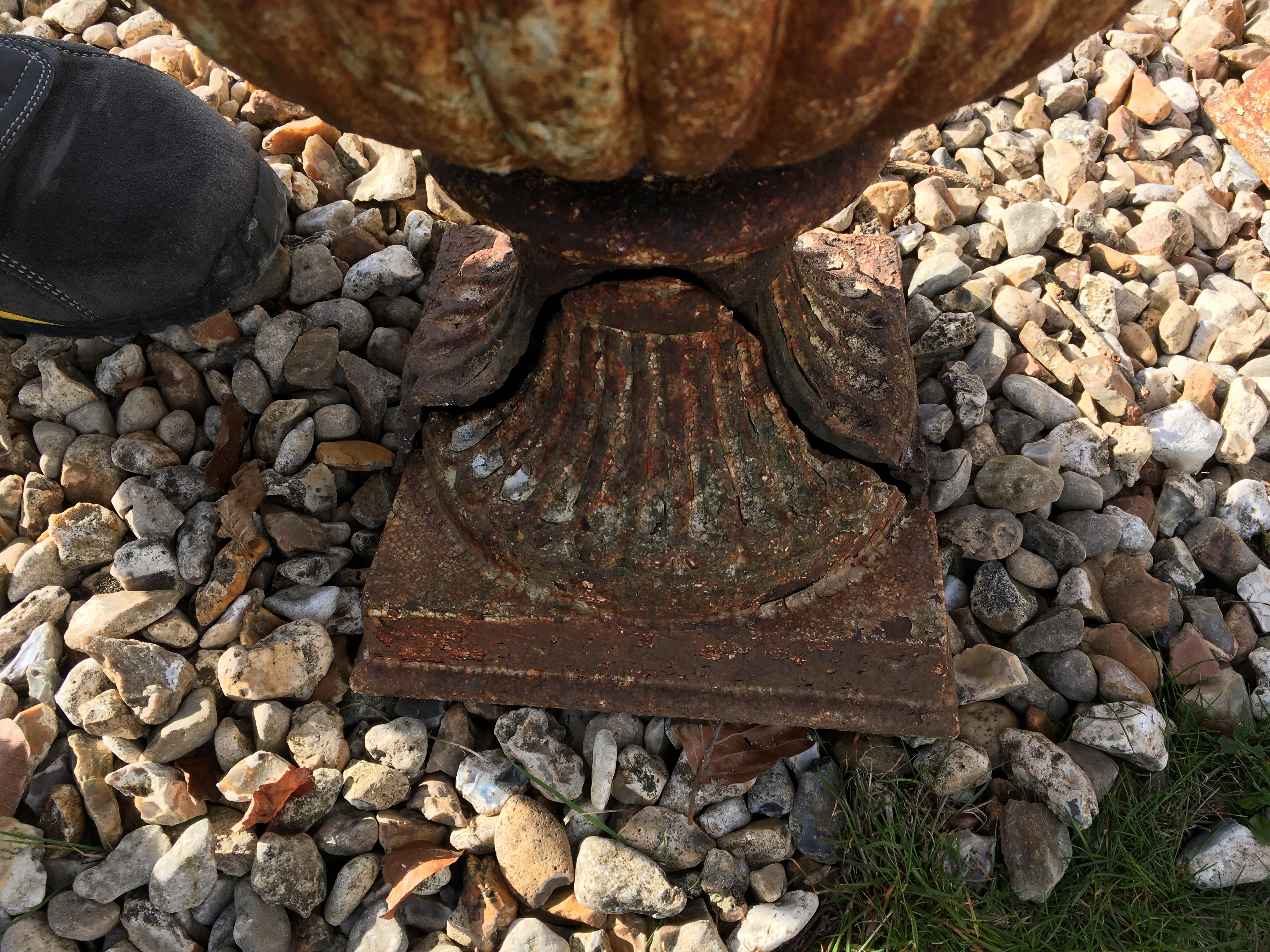 A pair of Victorian painted cast iron garden urns with egg and dart flared rims over fluted and - Image 3 of 3