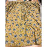 A single cotton twill mustard and blue foliate decorated interlined curtain with fixed triple