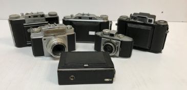 A collection of six various vintage Agfa cameras including an Ambi Silette, an Agfa Karat,