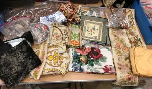 A box of assorted crosswork bell pull/vestment parts, Oriental silk panels, crewel work sample,