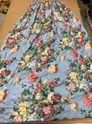 A pair of Schumacher blue ground floral bouquet decorated glazed cotton interlined curtains with