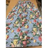 A pair of Schumacher blue ground floral bouquet decorated glazed cotton interlined curtains with