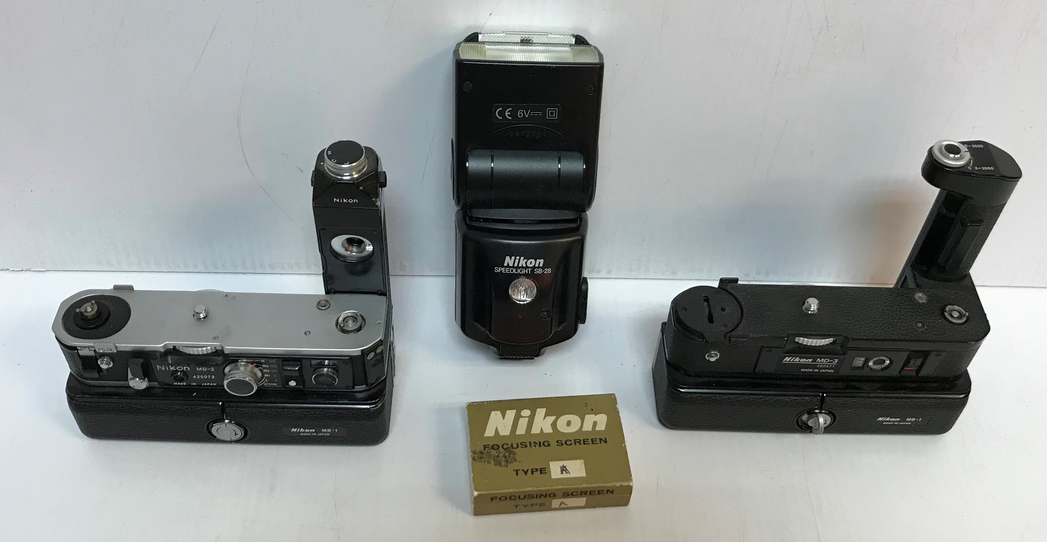 A collection of six various Nikon cameras to include an F4, F601, EM, FF2 and F-301, - Image 5 of 5