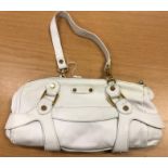 An Abaco white leather handbag with gilt brass fittings,