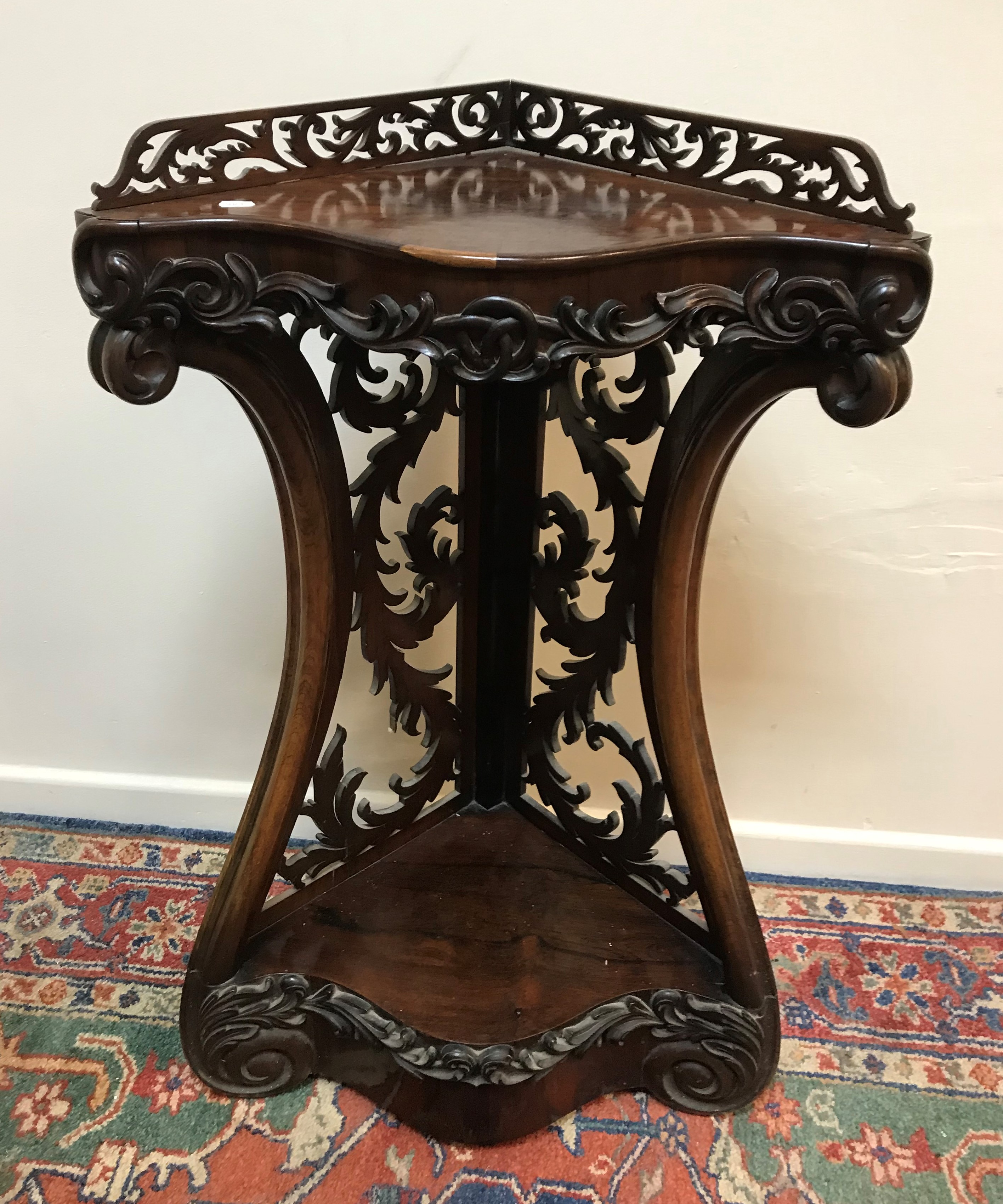 A Victorian rosewood corner shelf with fretwork galleried back over a serpentine front with applied - Image 2 of 2
