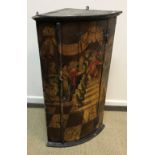 An 18th Century painted bow fronted hanging corner cupboard decorated with a court scene,