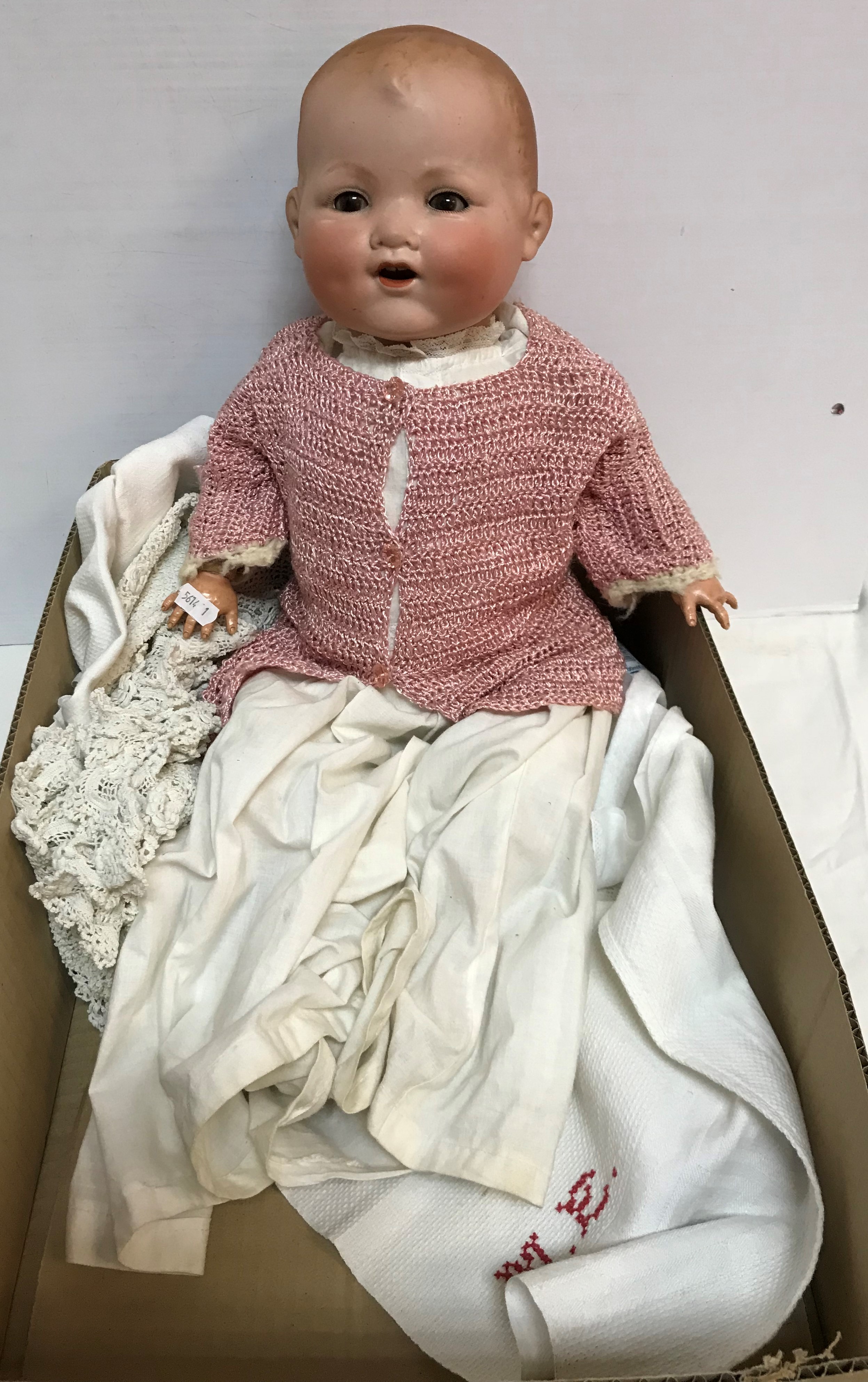 An early 20th Century Armand Marseille bisque headed doll "Baby Gloria" with sleep eyes and open