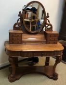 Three various Victorian mahogany duchess dressing tables with mirrored superstructures over frieze