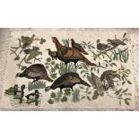 A 20th Century needlepoint rug / wall hanging decorated with pheasants, ducks, teal, widgeon, etc,