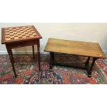 A modern mahogany and inlaid games top table with single frieze drawer on slender turned and ringed