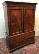 A Victorian mahogany linen press,