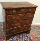 An 18th Century walnut chest,