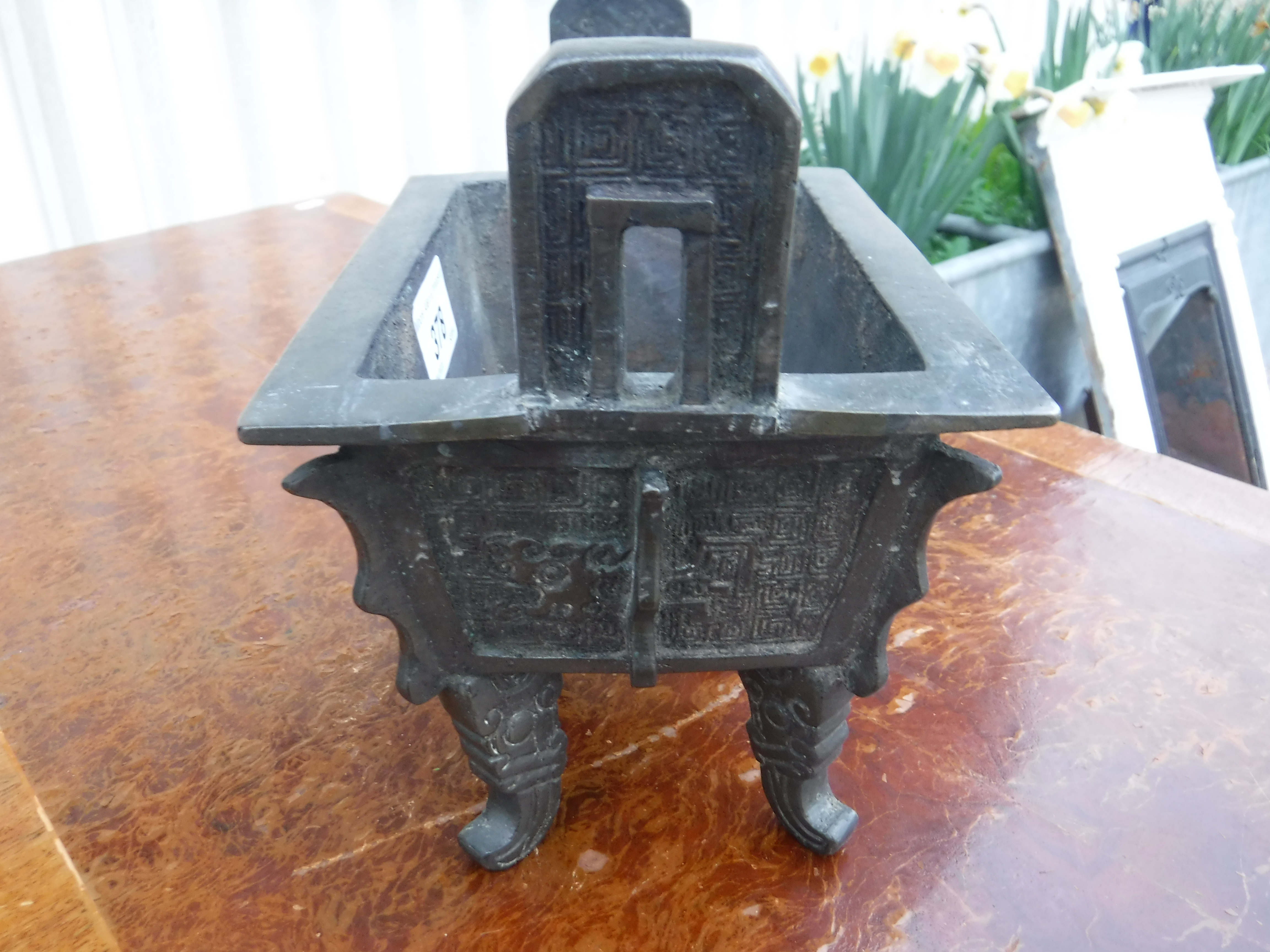 A Chinese bronze censer of rectangular form with relief work foliate decoration, - Image 3 of 19