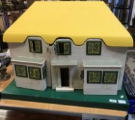 An early to mid 20th Century Triang painted wooden dolls house model 3146 "Y Bwtchyn Bach" a model