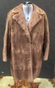 A musquash fur jacket,