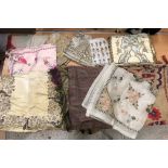 A box of assorted ethnic textiles to include sari remnant, Indian, Chinese, Pakistan,