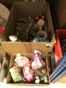 A box containing assorted decorative china wares to include various Coalport figures,