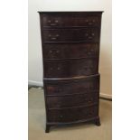 A reproduction mahogany bow fronted chest on chest,