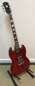 A Jim Deacon Gibson SG style guitar with red body