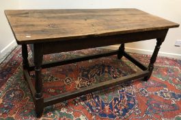 An 18th Century and later refectory style dining table,