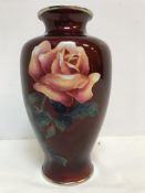 A 20th Century red ground cloisonne vase with rose spray decoration,
